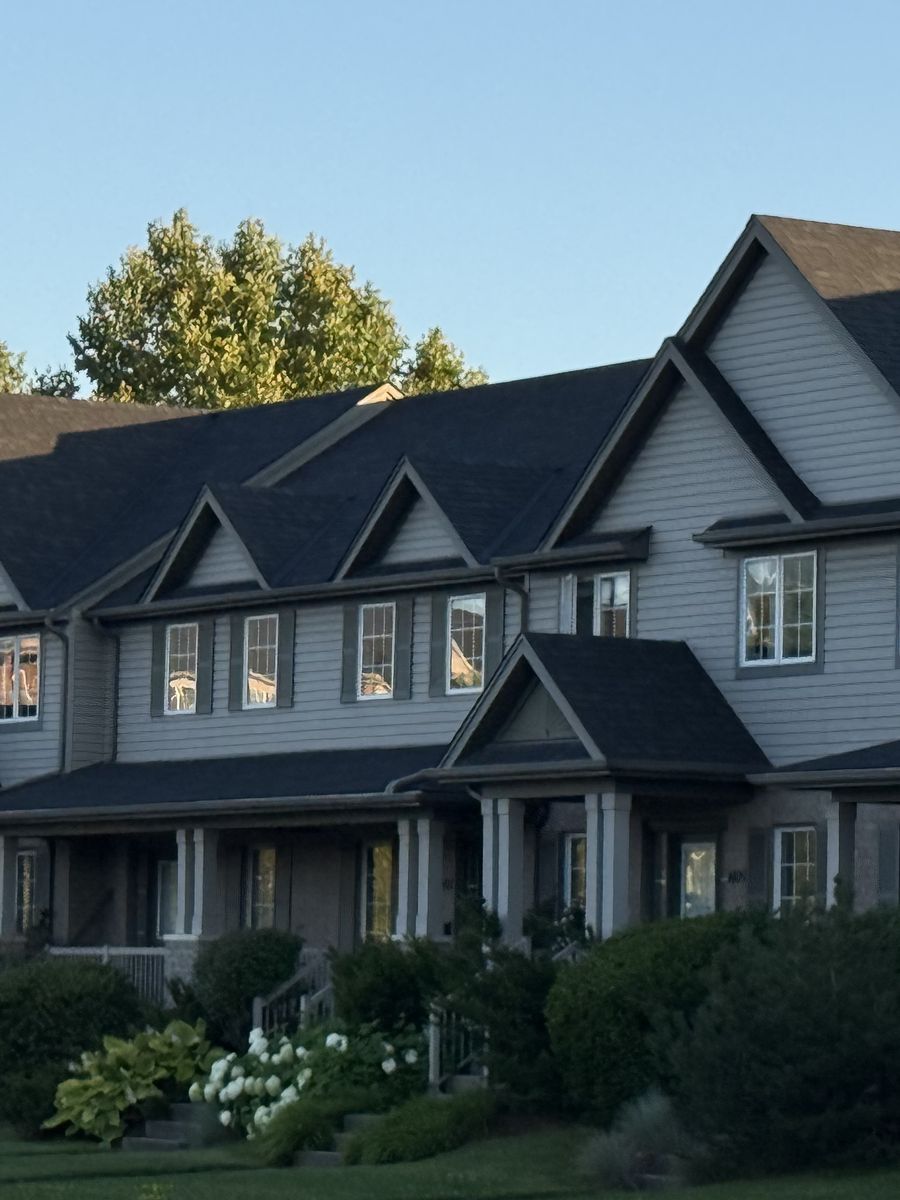 Townhouses with gabled roofs on a Guelph street